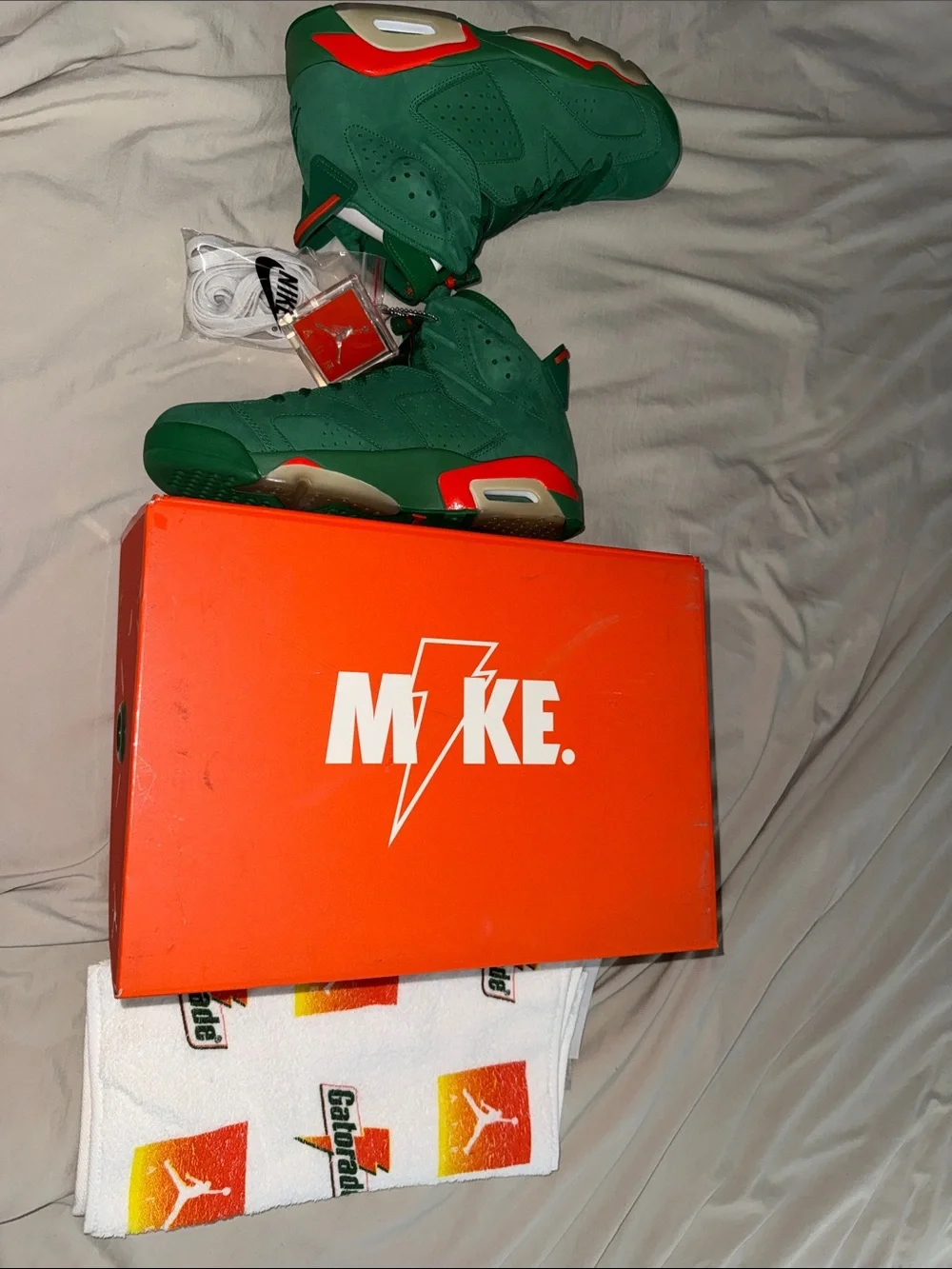 Jordan Retro 6 Sneakers in Green with Orange Accents